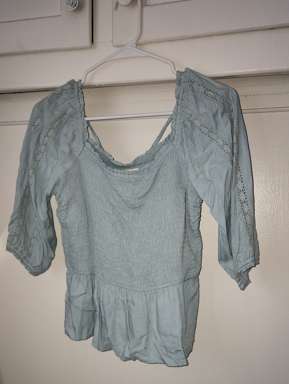 Smocked Peplum Blouse in Light Blue